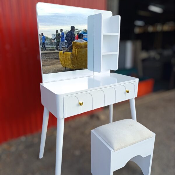 Elegant dressing mirror with cozy stool