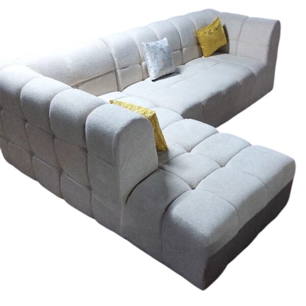 Spacious white L shaped sofa