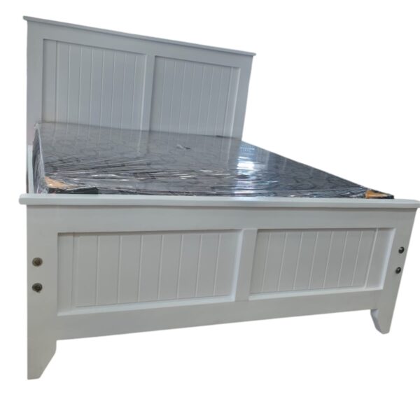 White wooden 5by6 bed